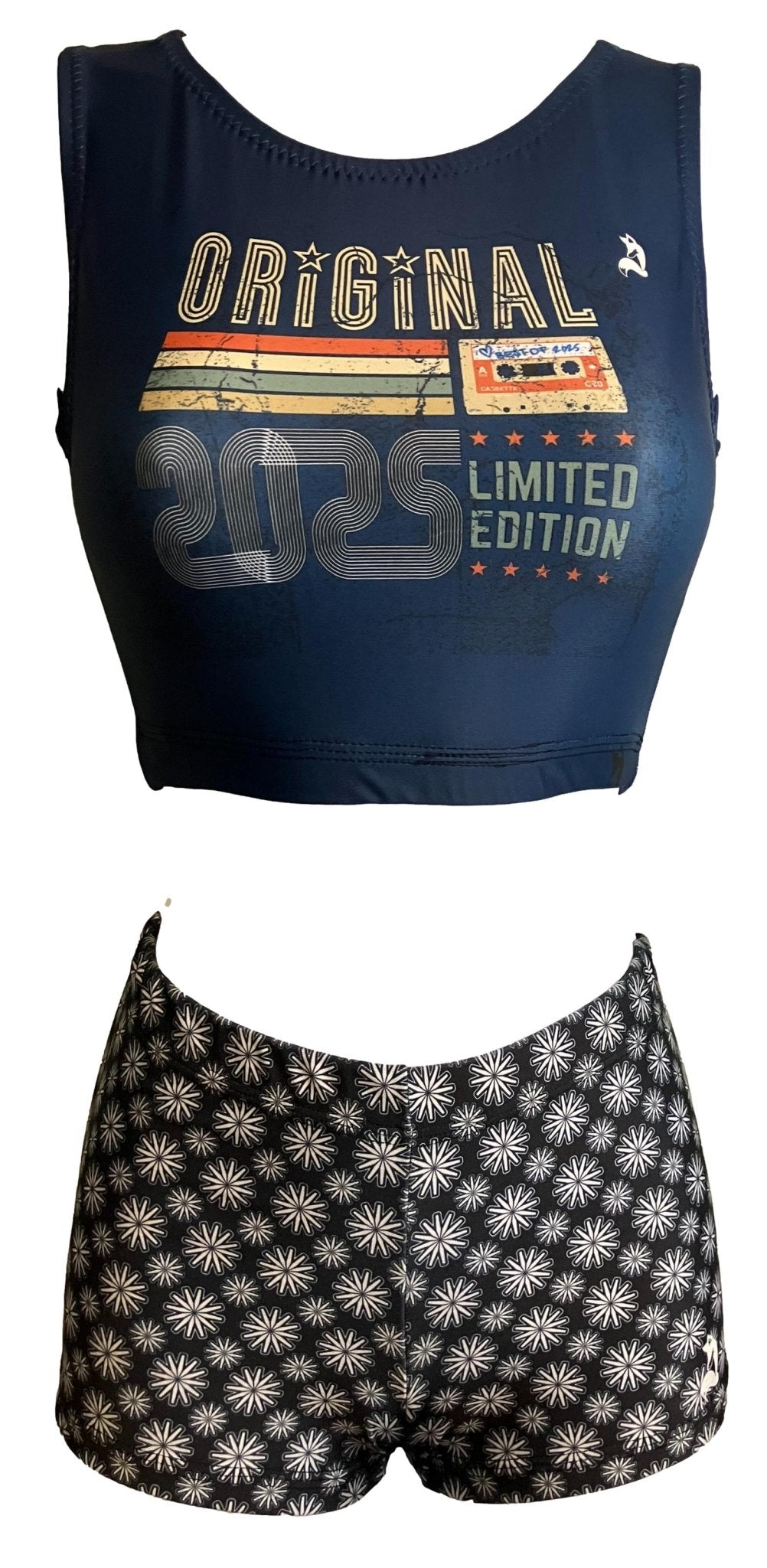 Foxy's 2025 two-piece set: blue crop top with 'Original' and floral print shorts.