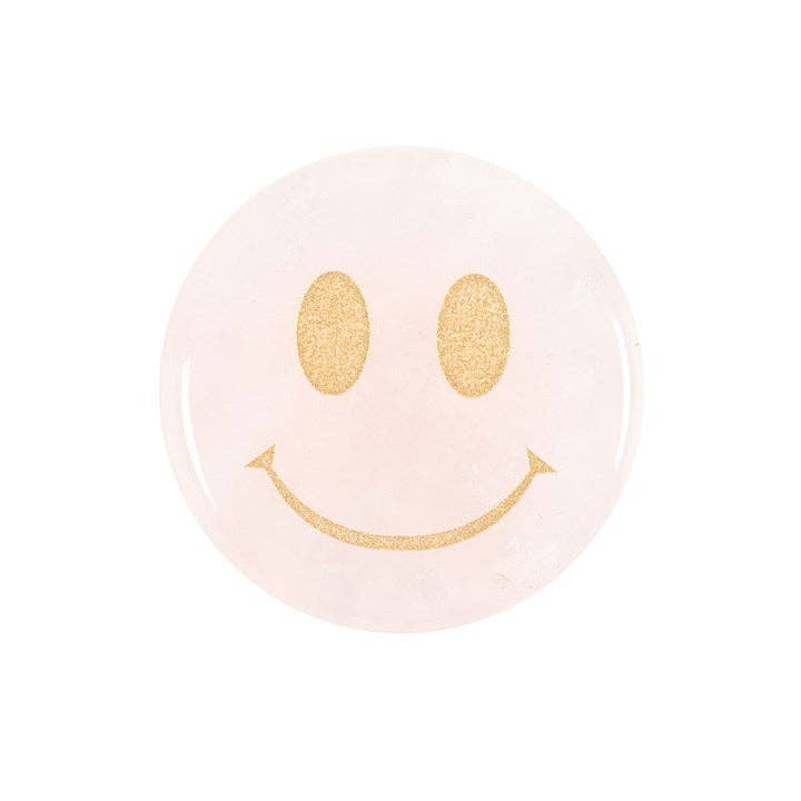 Smiley face decorative paperweight with gold glitter details, isolated on white.