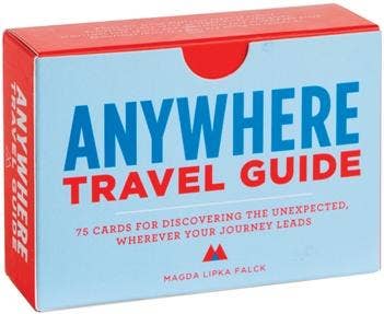 Box of 'Anywhere Travel Guide' cards with red and blue design
