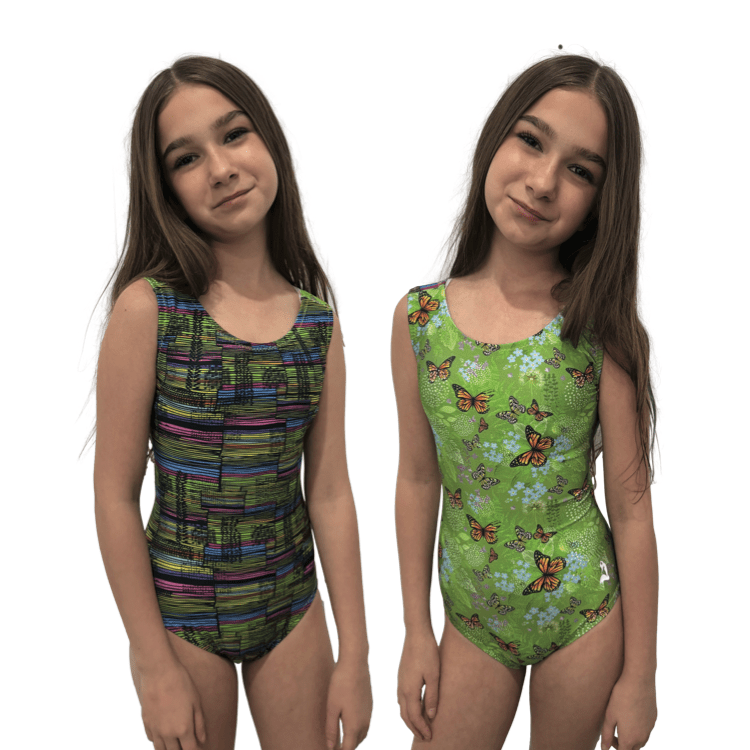 Gymnast wearing green foxy leotards with different complimentary nature patterns in green tones with butterflies
