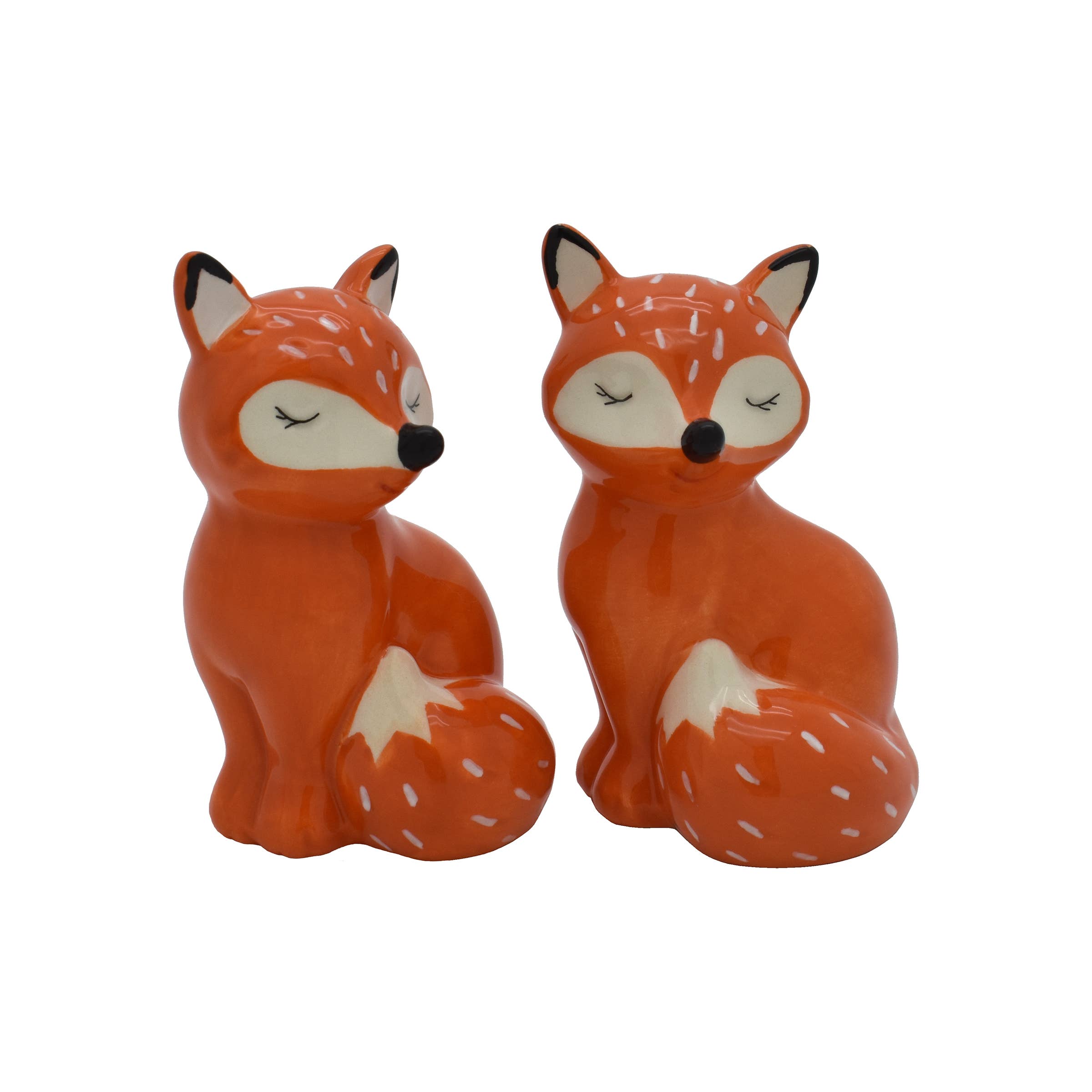 Fox salt and pepper shakers, ceramic, orange with white details, whimsical kitchen decor.