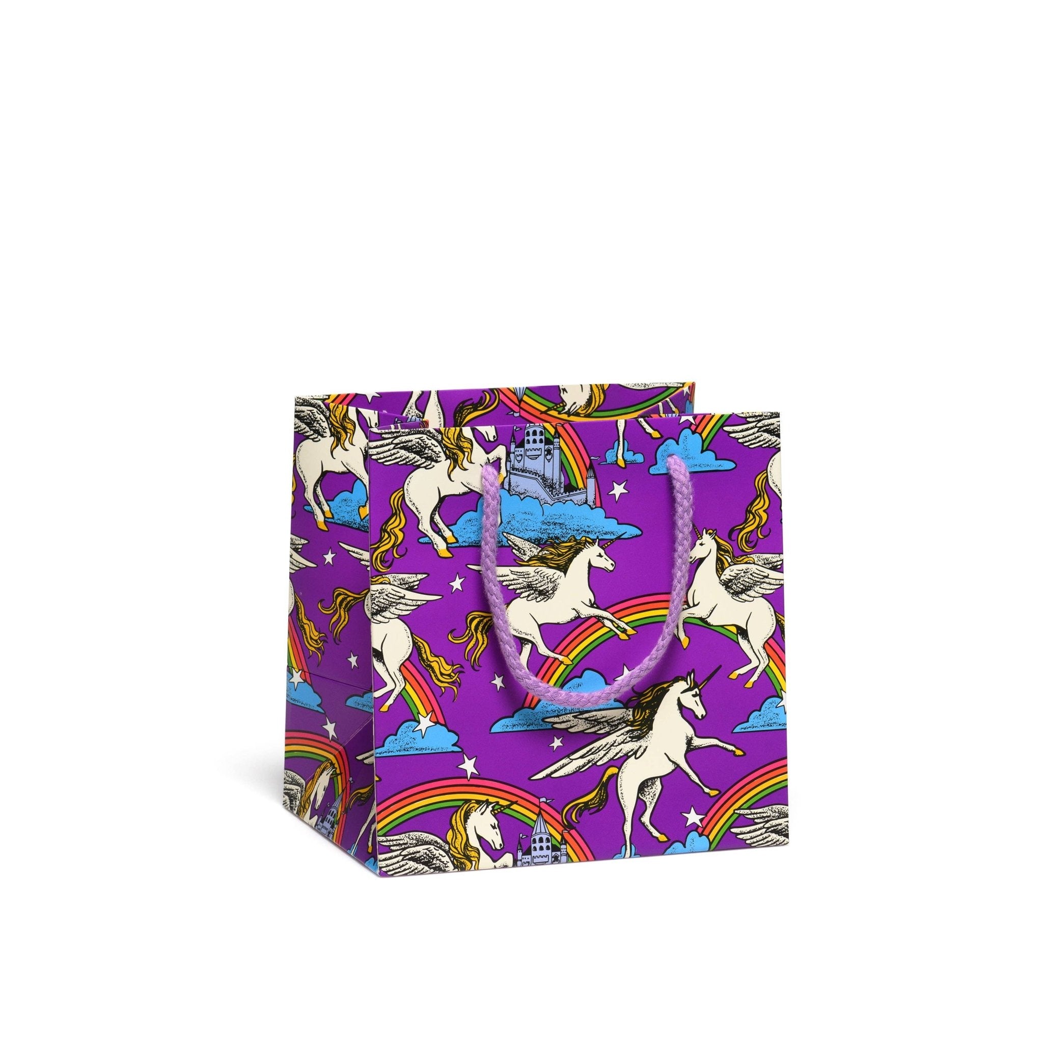 Small purple gift bag featuring unicorns, rainbows, and castles. Perfect for magical presents!