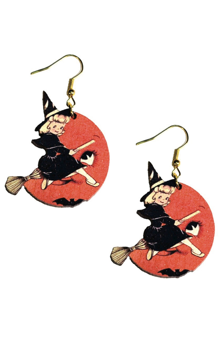 A pair of round drop earrings featuring a vintage-style illustration of a young girl in a black witch hat and dress riding a broomstick against a red full moon background, with gold-tone fishhook wires.