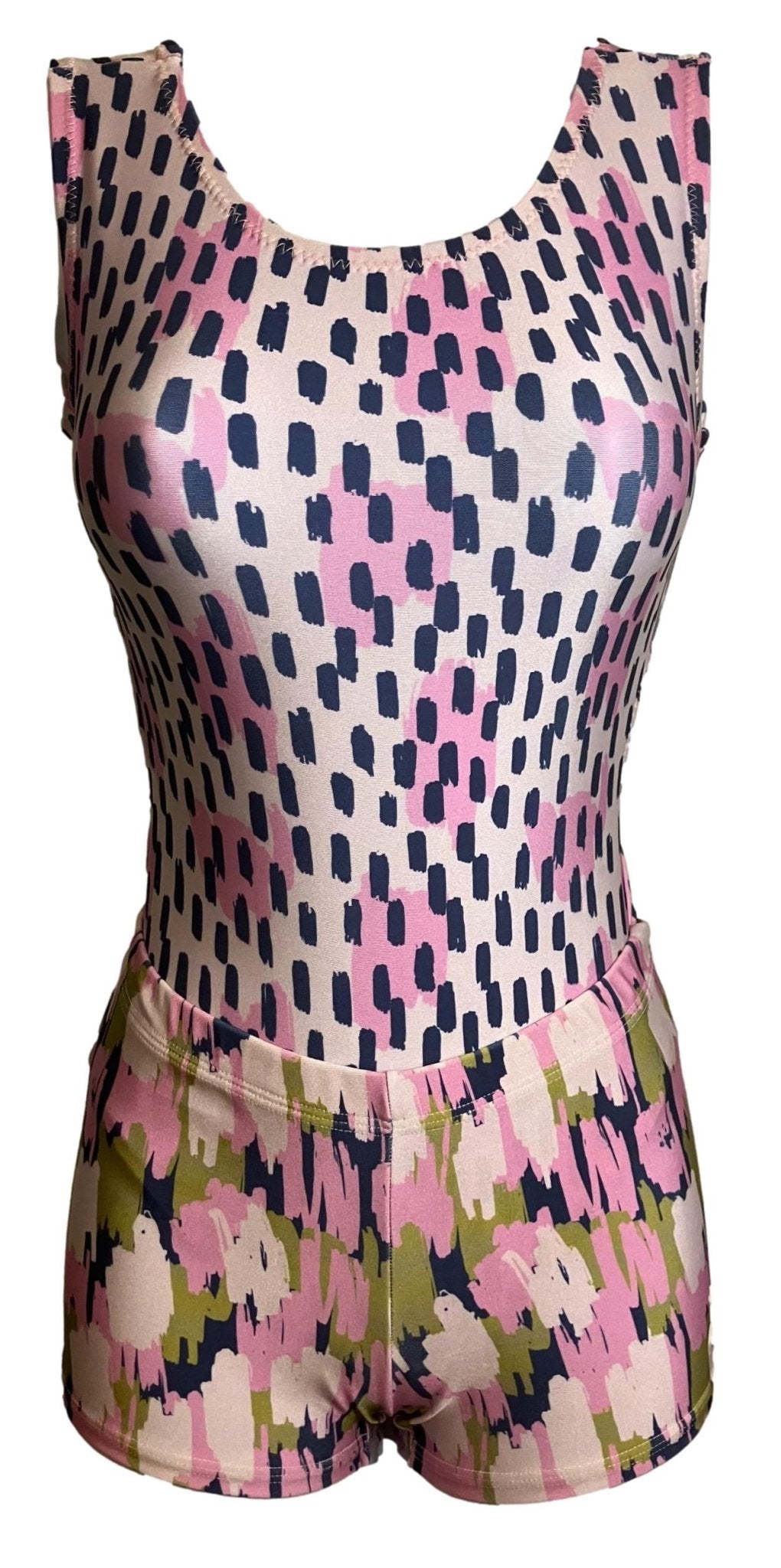 Sleeveless bodysuit with playful pink, black, and cream abstract print, paired with matching shorts.