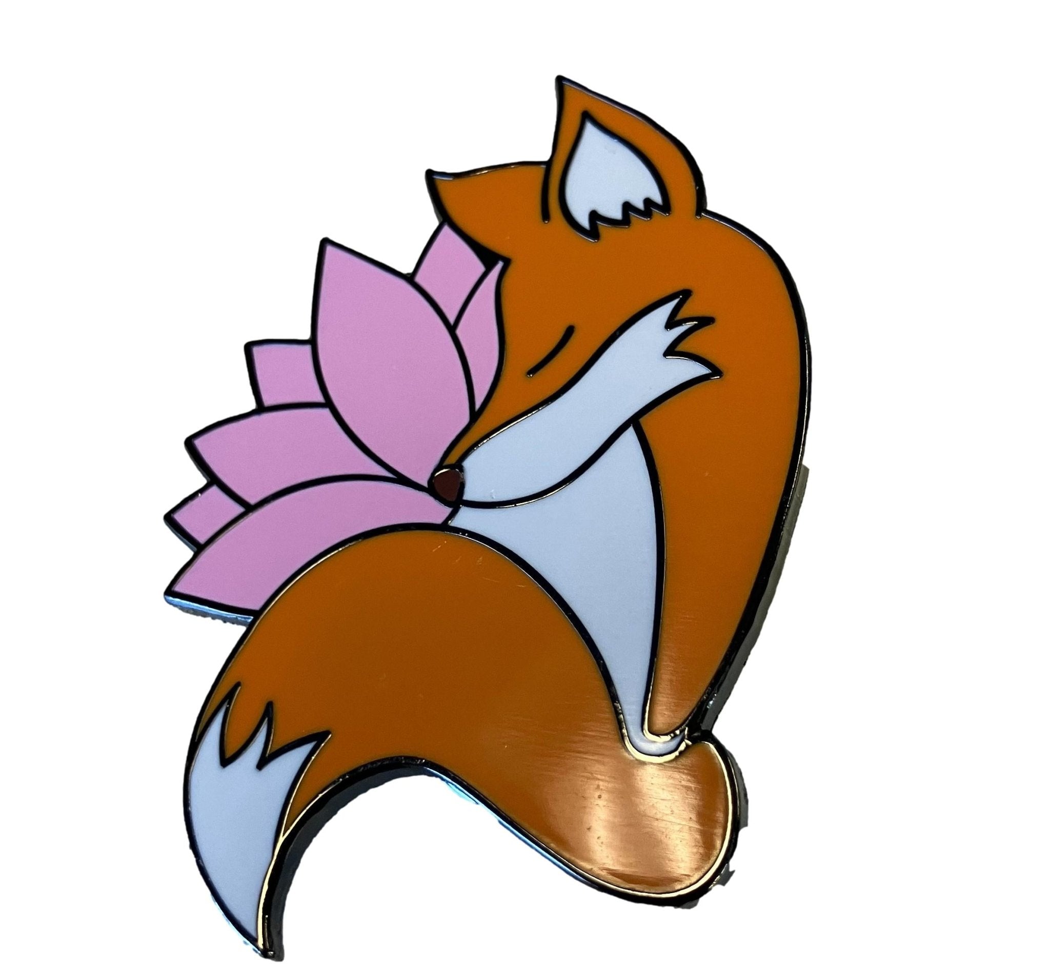 Sleeping fox enamel pin with pink lotus flower accent.