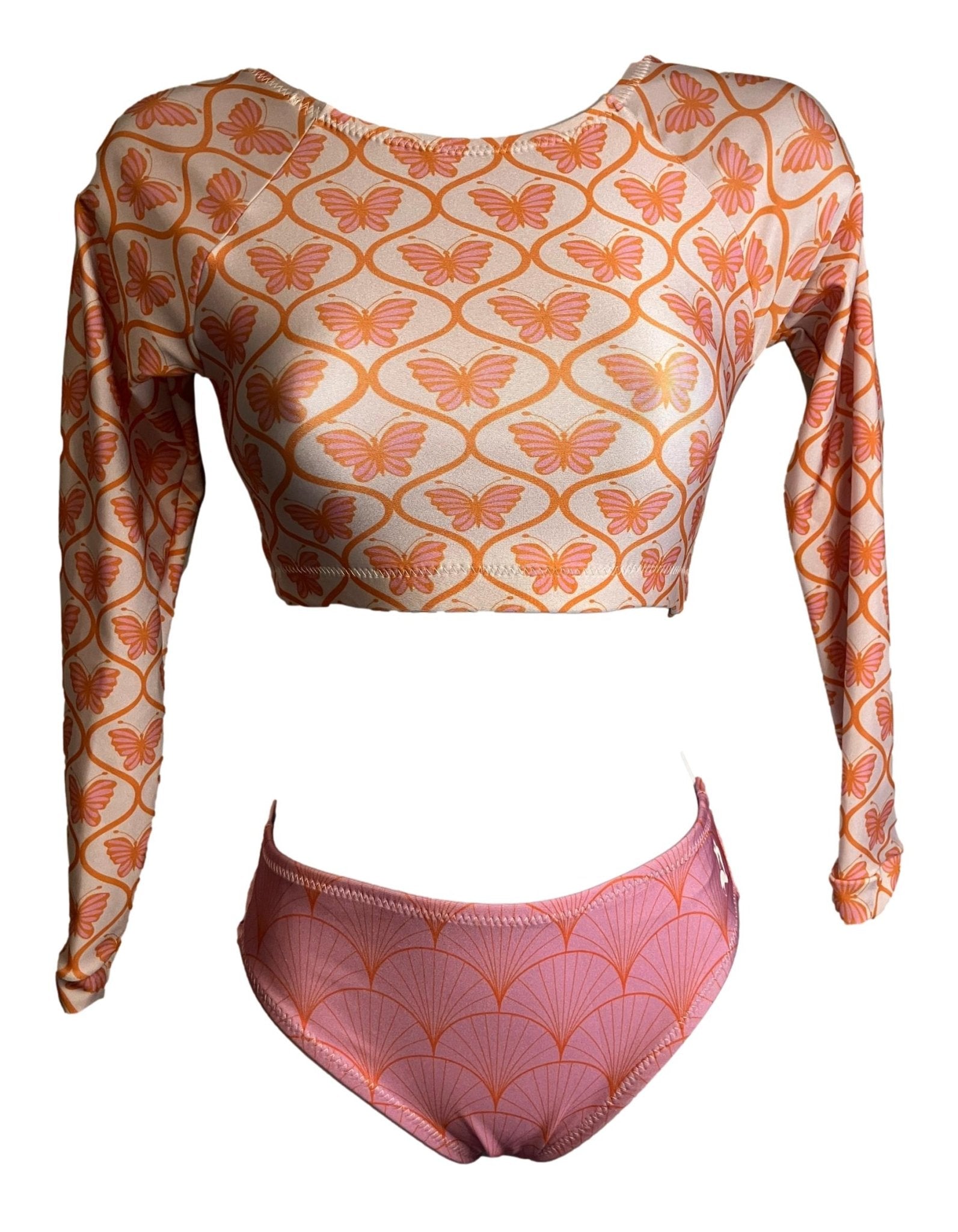 Foxy's Butterflies & Fans Surfkini set featuring a long sleeve crop top and bikini bottom with a butterfly and fan pattern.