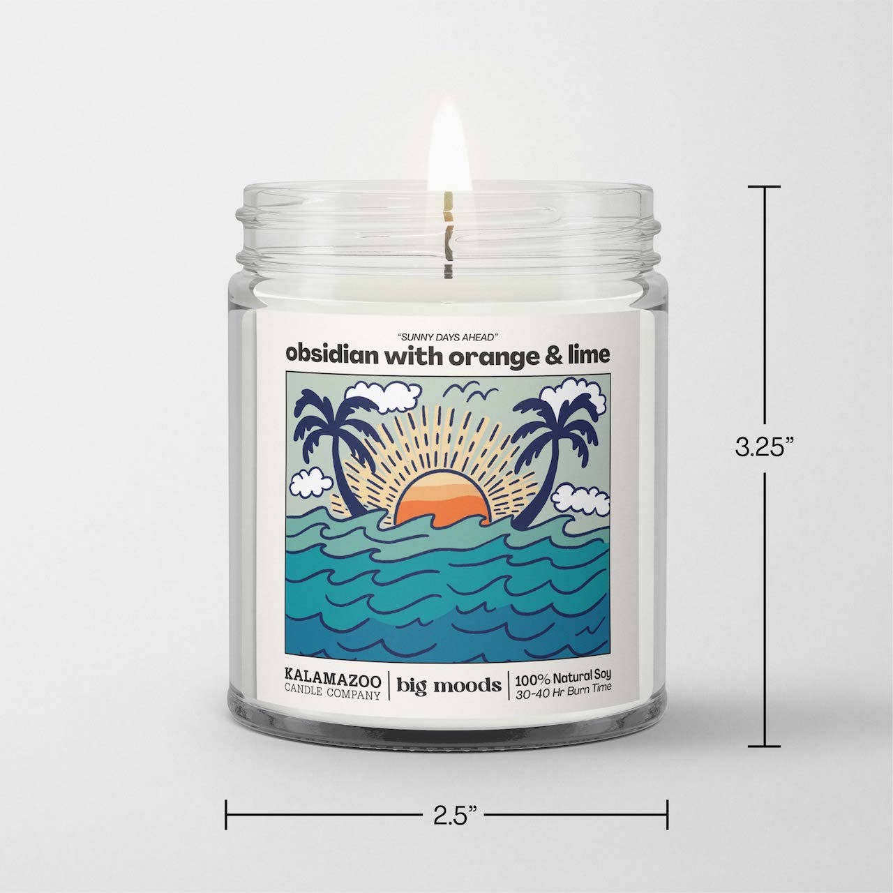 Kalamazoo Big Moods 'Obsidian with Orange & Lime' natural soy candle in glass jar, burning with 30-40 hour burn time.