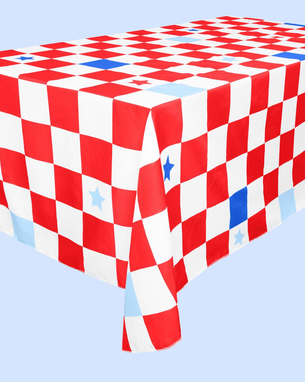 Red, white, and blue checkered tablecloth on a light blue background