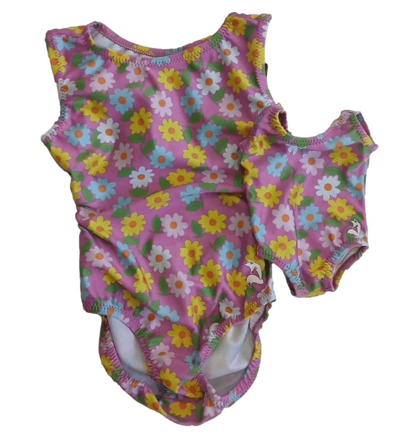 Children's tumble tot doll leotard set with a pink floral pattern on a white background