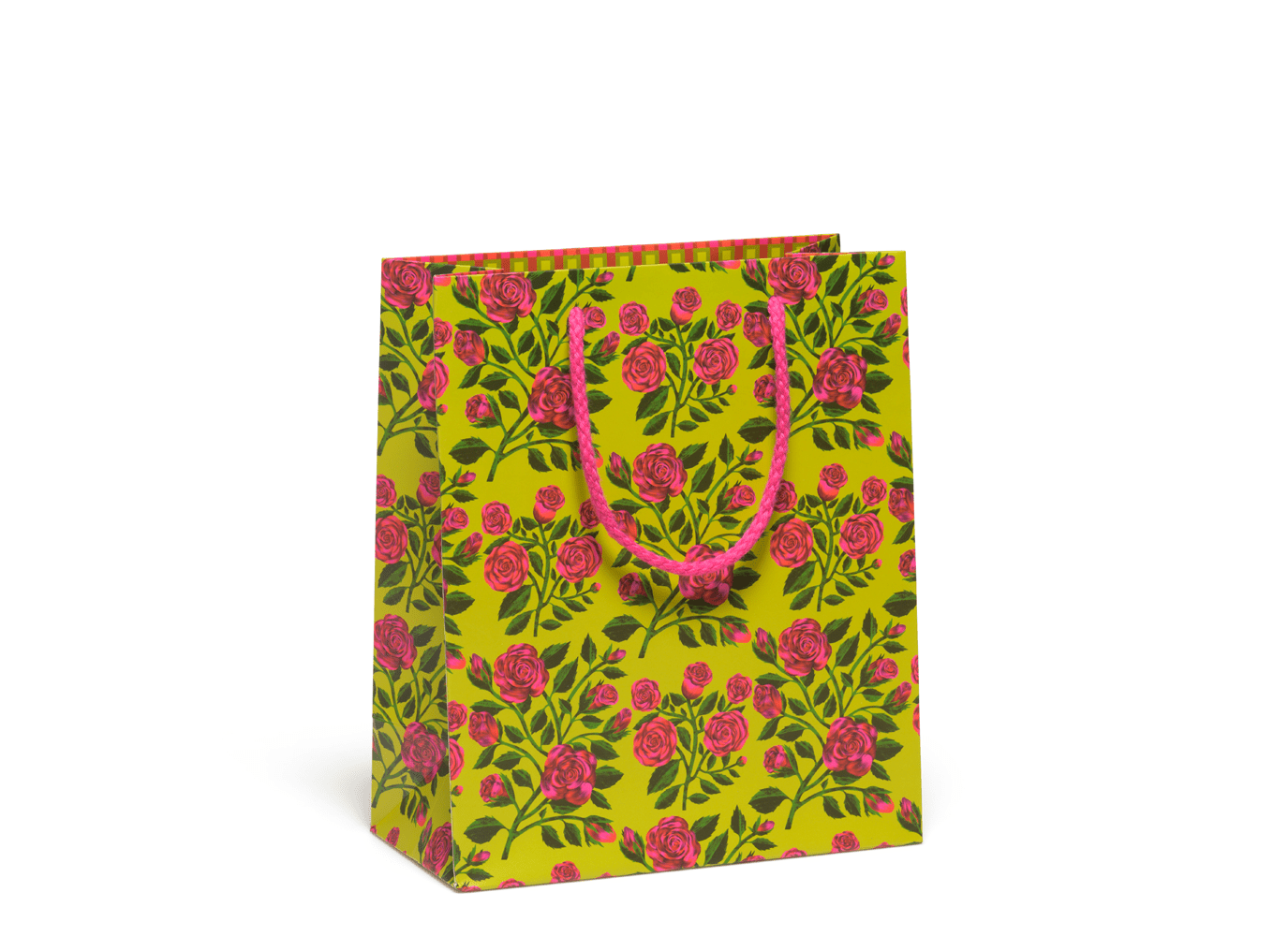 Floral gift bag with pink rope handles. Medium size bag with rose pattern on a green background.