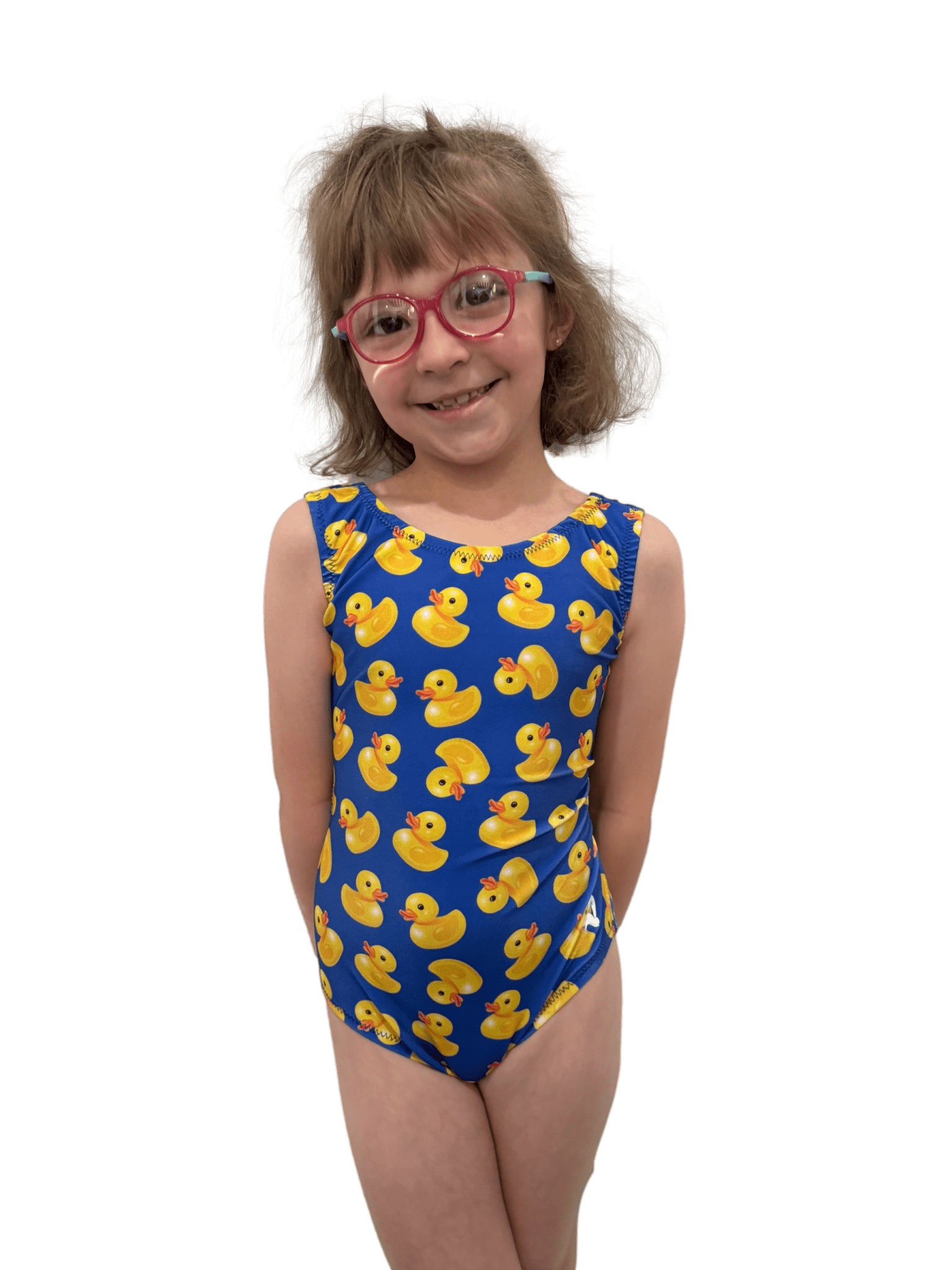 Child wearing a blue foxy leotard with yellow rubber duck pattern on a white background