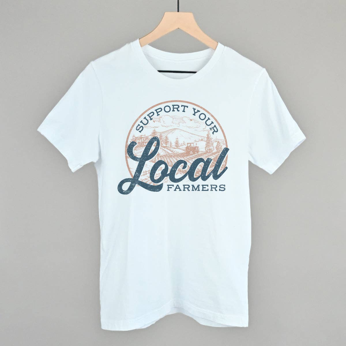 White t-shirt with 'Support Your Local Farmers' graphic.