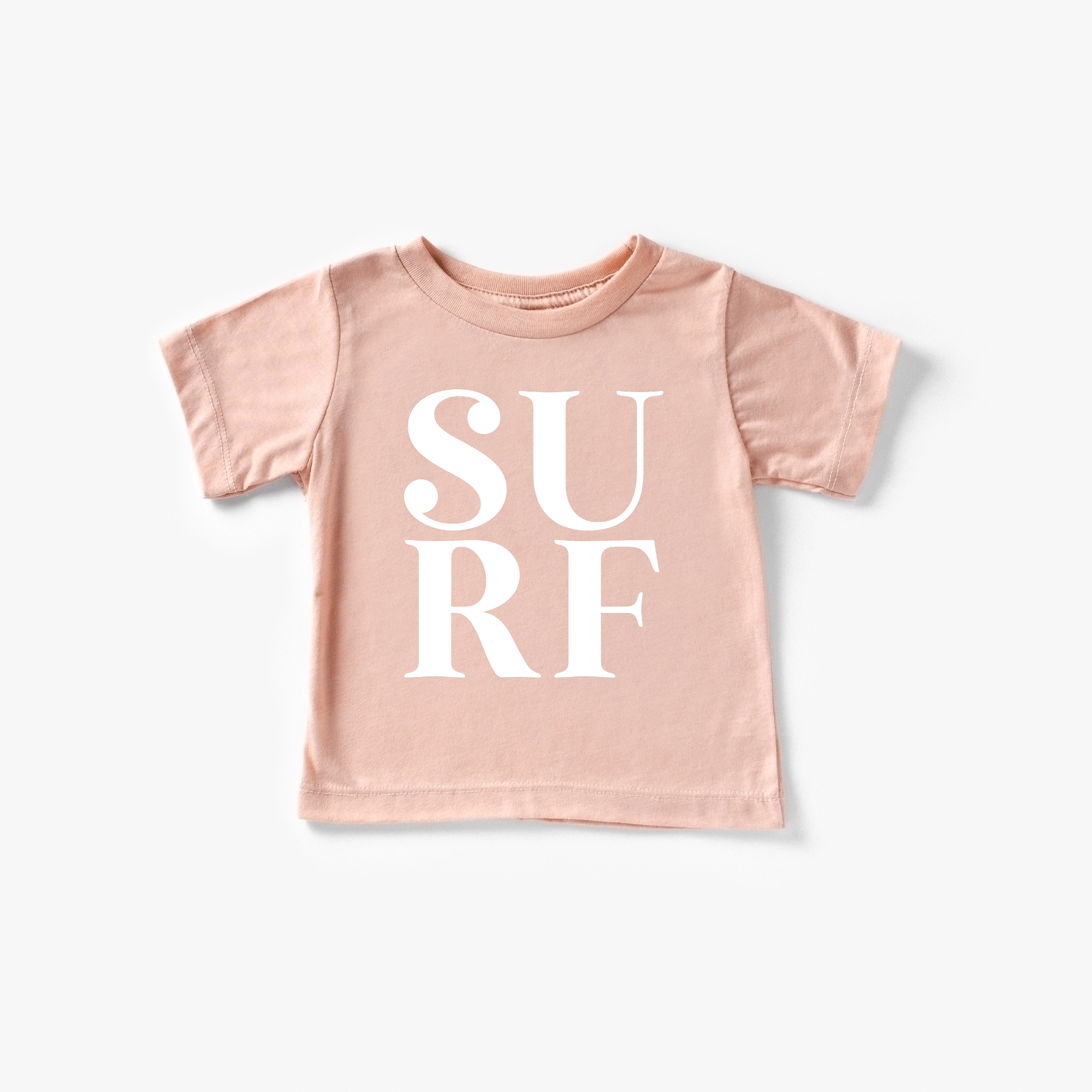 Salmon toddler t-shirt with 'SURF' in white block letters.