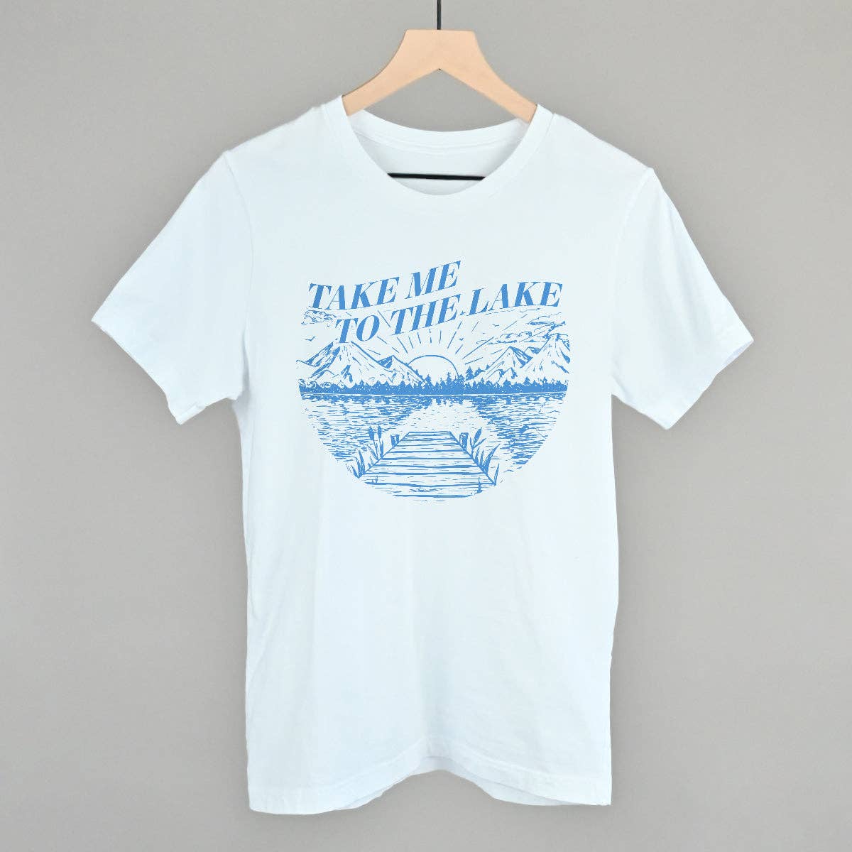 White t-shirt with 'Take Me To The Lake' graphic print in blue.