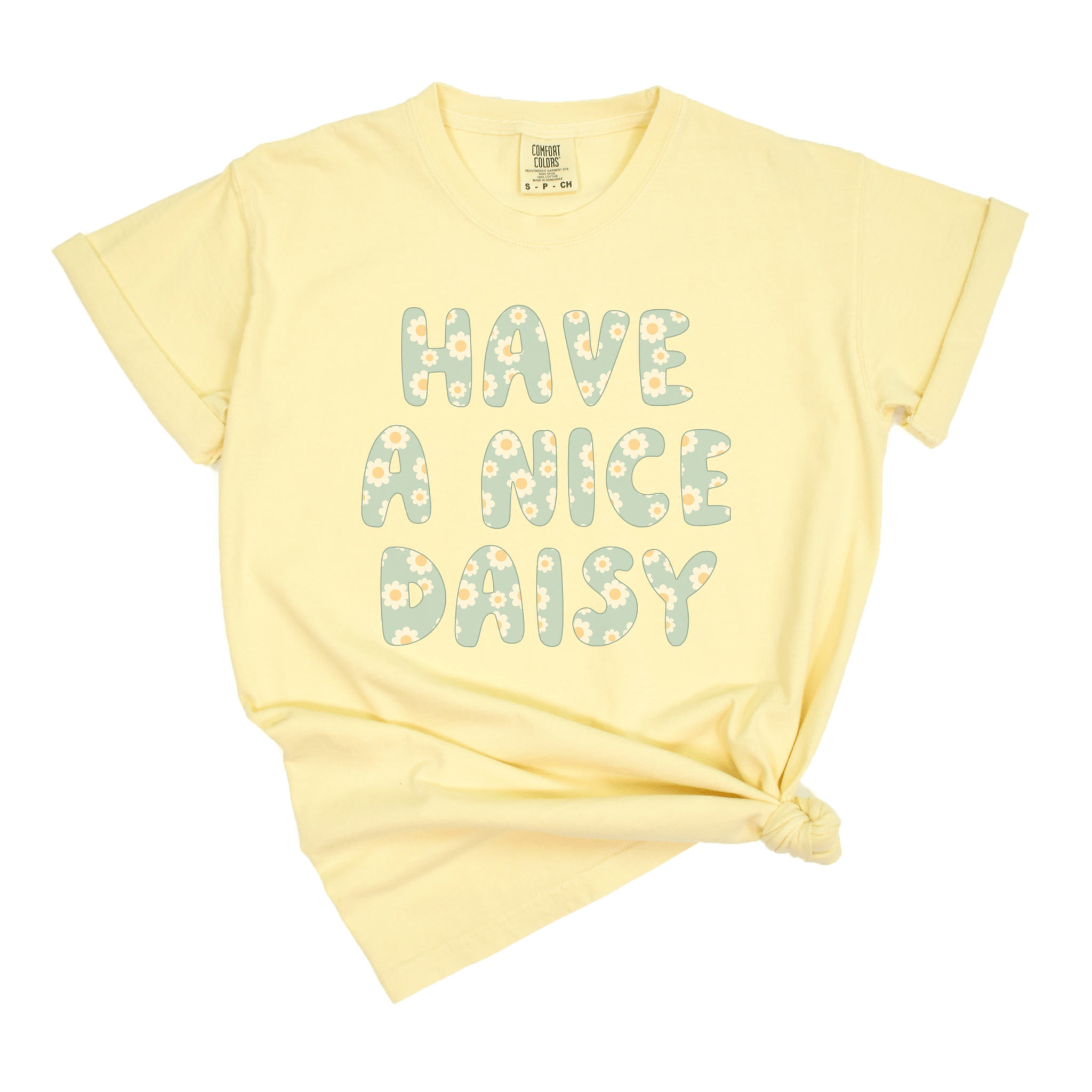 Yellow t-shirt with 'Have A Nice Daisy' text filled with daisy pattern.