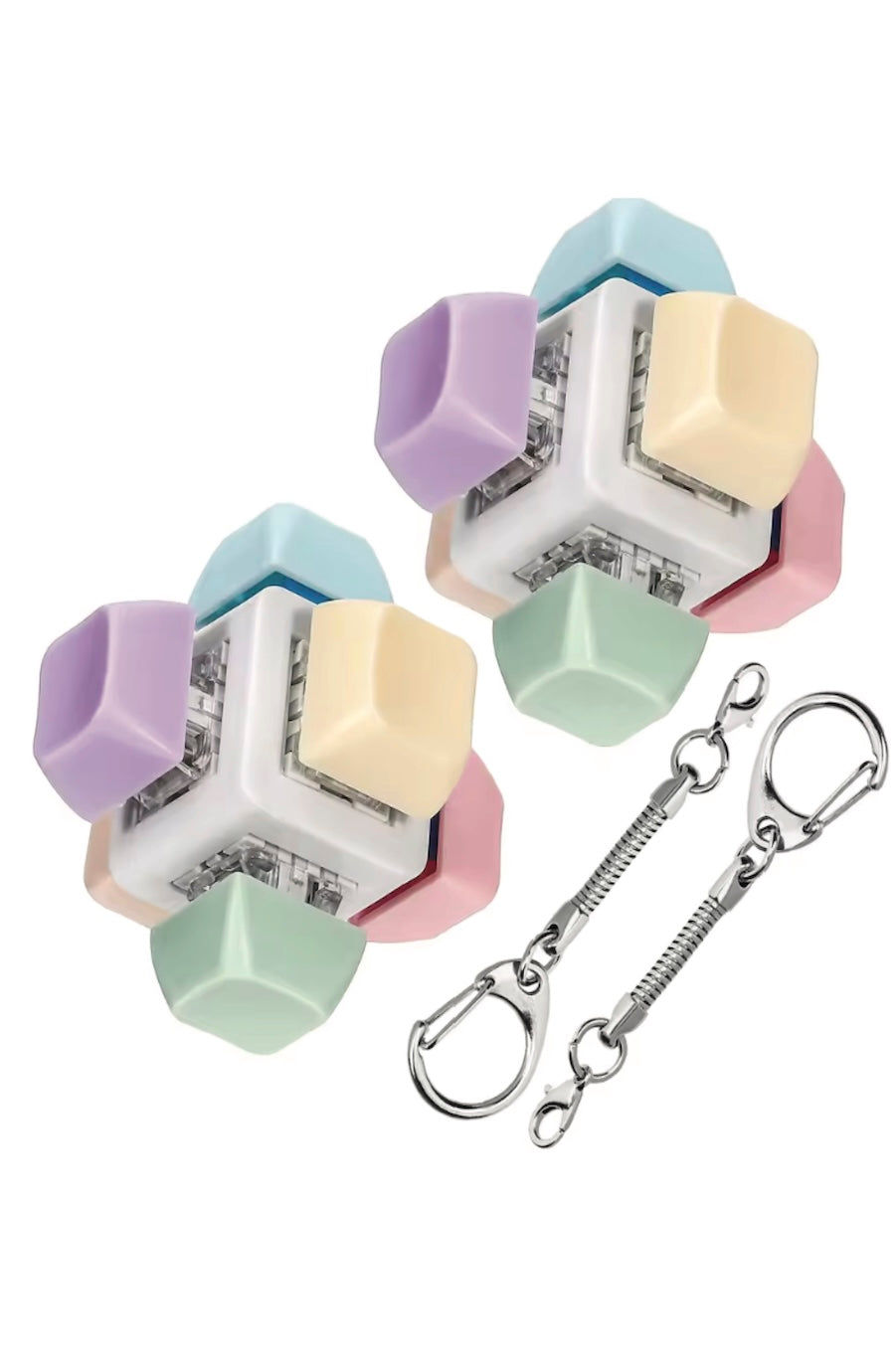 Two pastel-colored cube-shaped keychains with silver metal keyrings and spring clips, shown on a plain white background.