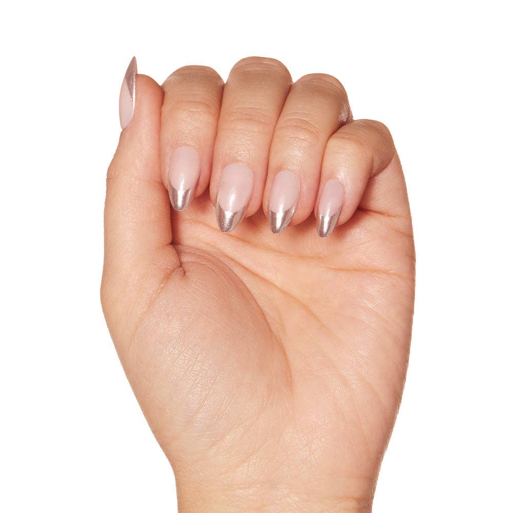Hand showcasing almond shaped nails with silver tips.