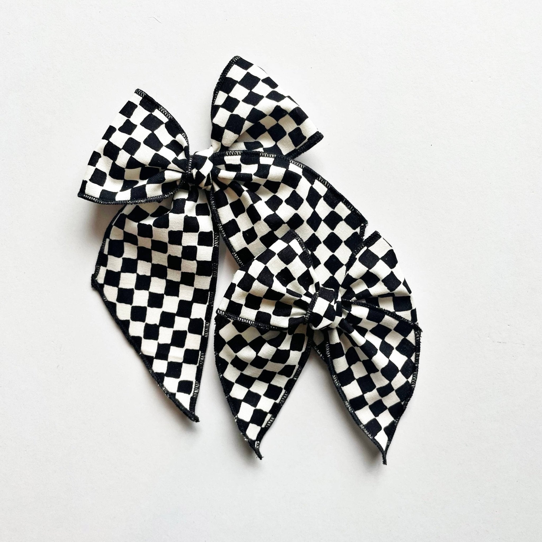 Checkered hair bows, black and white pattern