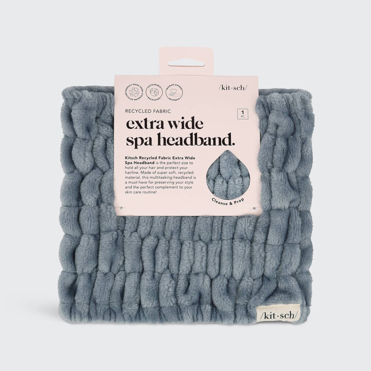 Kitsch extra wide spa headband in packaging. Soft, blue, recycled fabric headband.