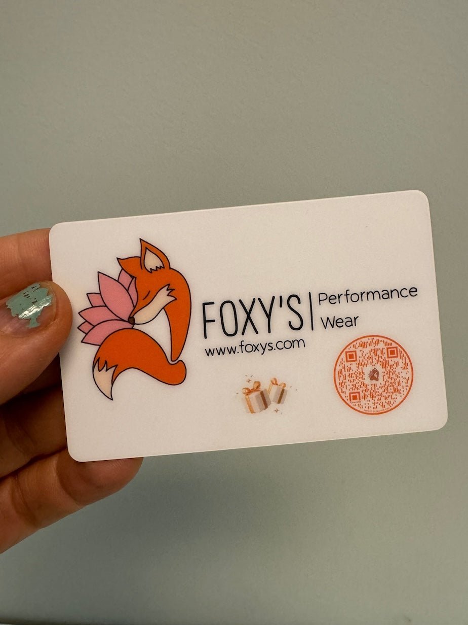 Foxy's Performance Wear business card with a fox logo, website address, and QR code.