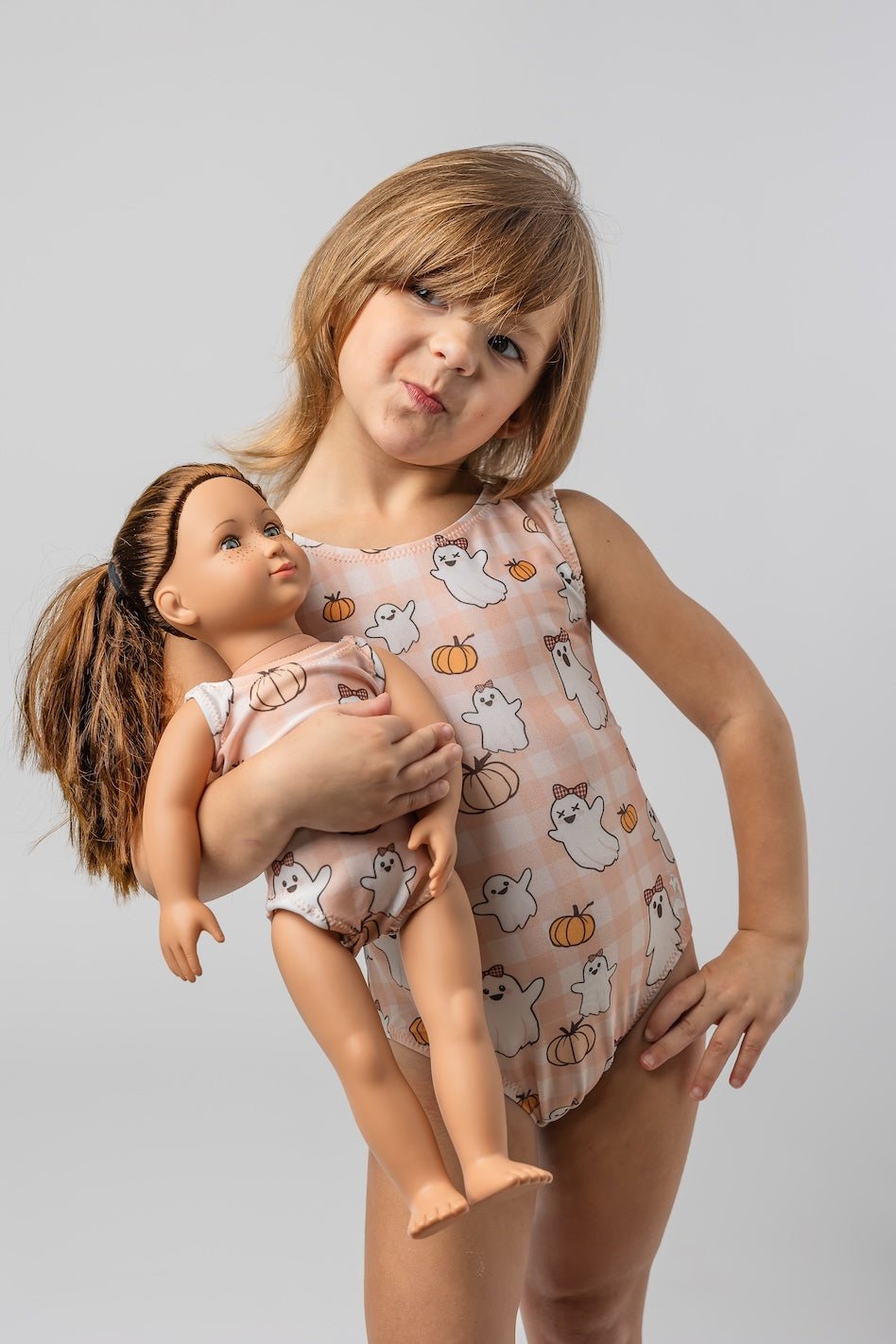 toddler leotard with matching doll leotard set in a cute halloween print with pumpkins and ghosts