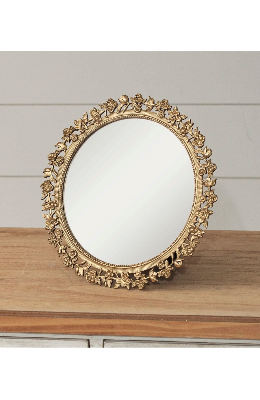 round gold mirror