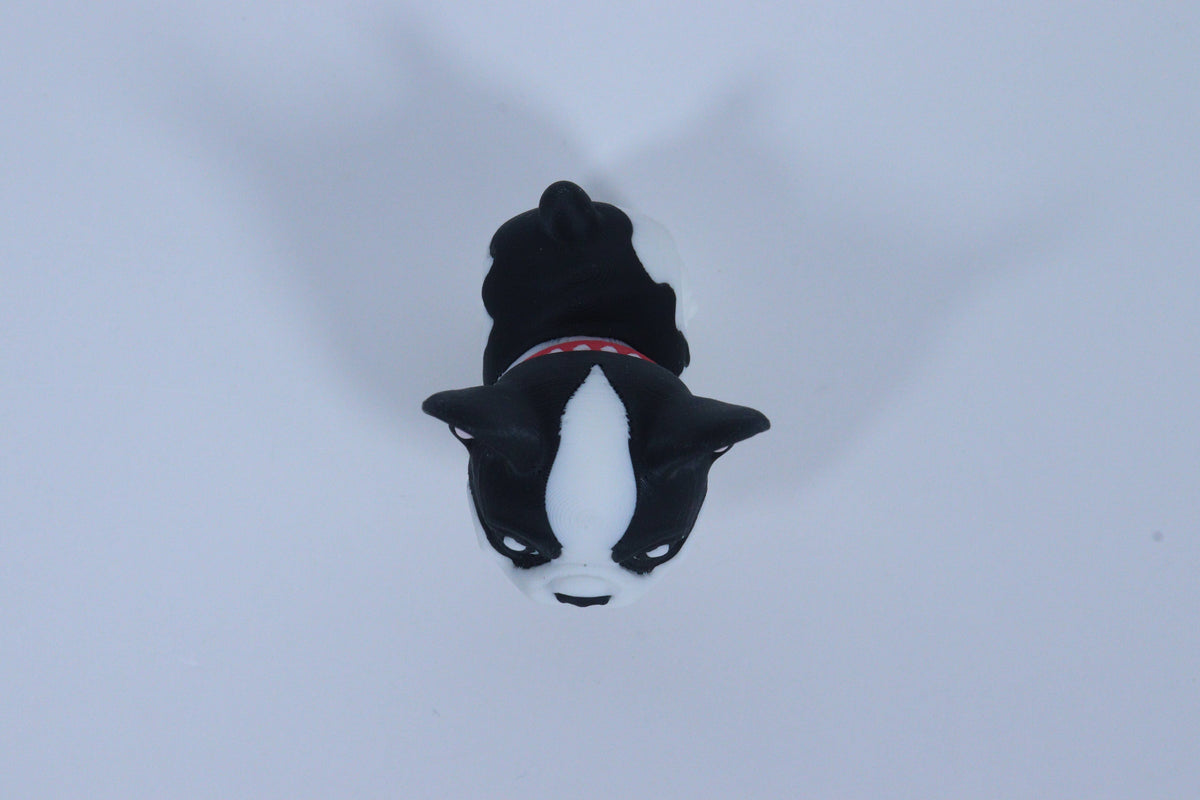 Dog sledding through a snowy landscape 3d printer dog