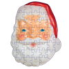 A jigsaw puzzle featuring a classic Santa Claus face, with white beard-like shapes, red hat, and blue eyes, photographed against a plain white background.