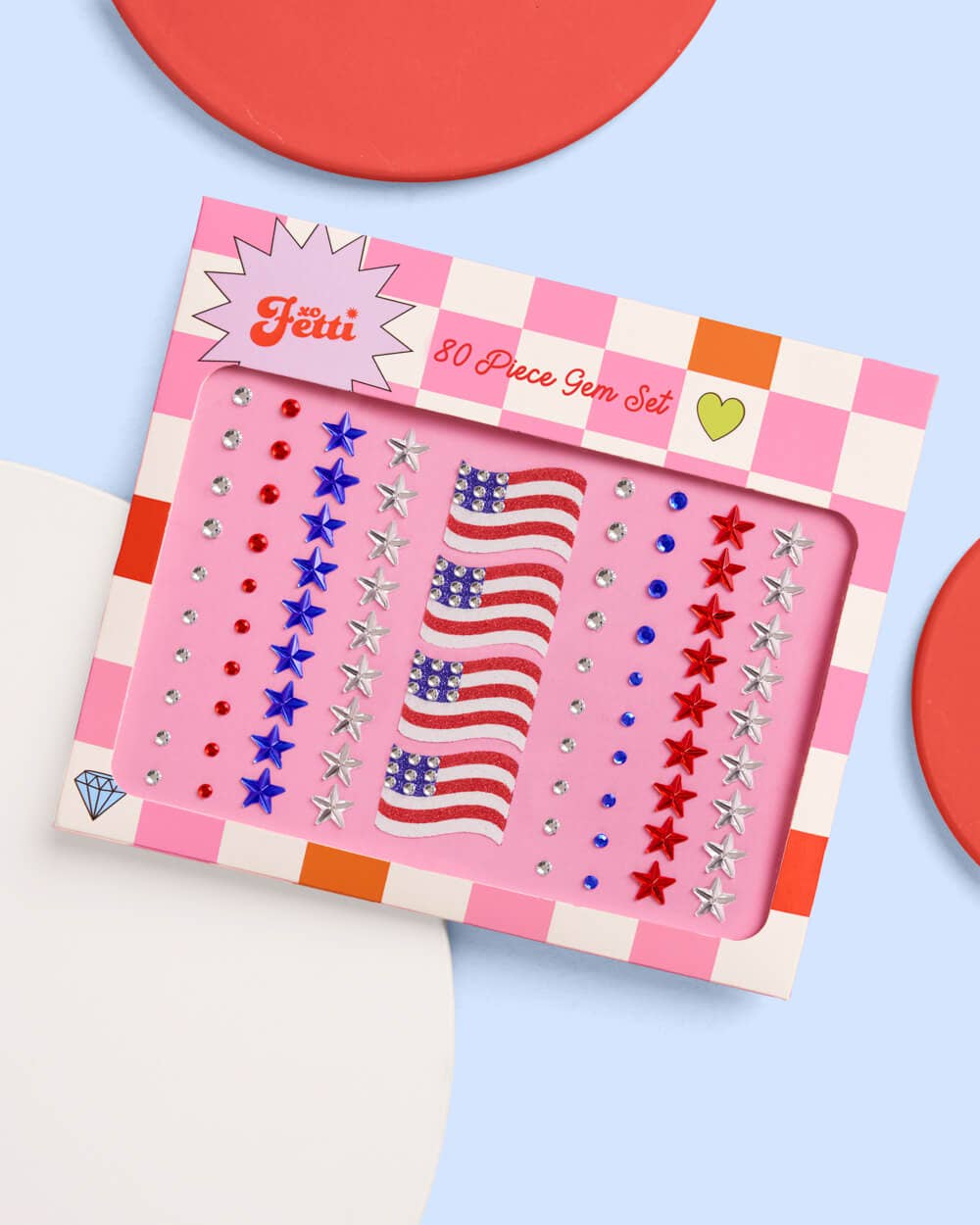 80-piece gem set with American flag design on a pink card against a colorful background