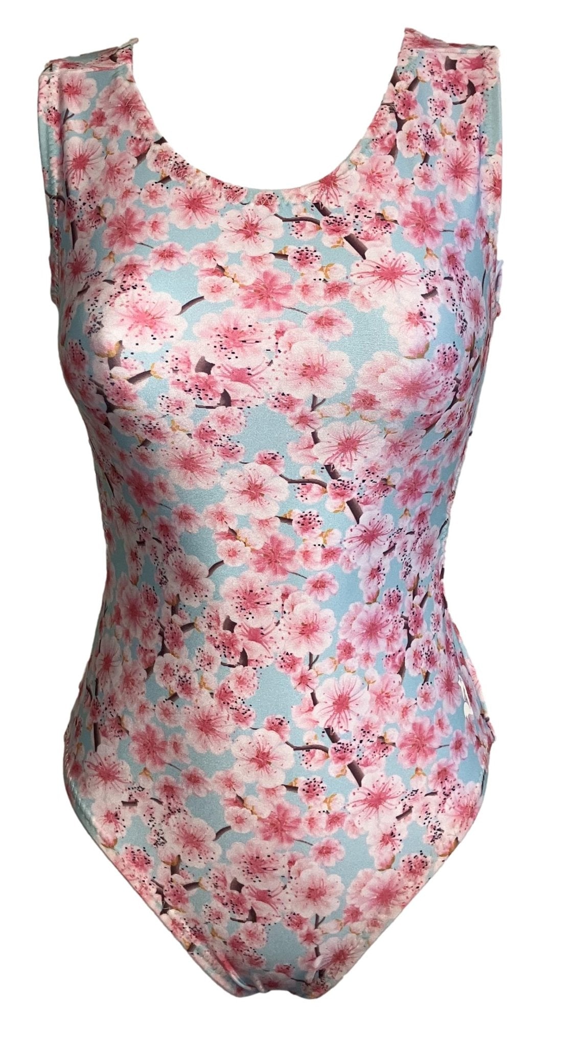 cherry blossom printed gymnastics leotard for girls on a light blue background perfect for gymnastics practice