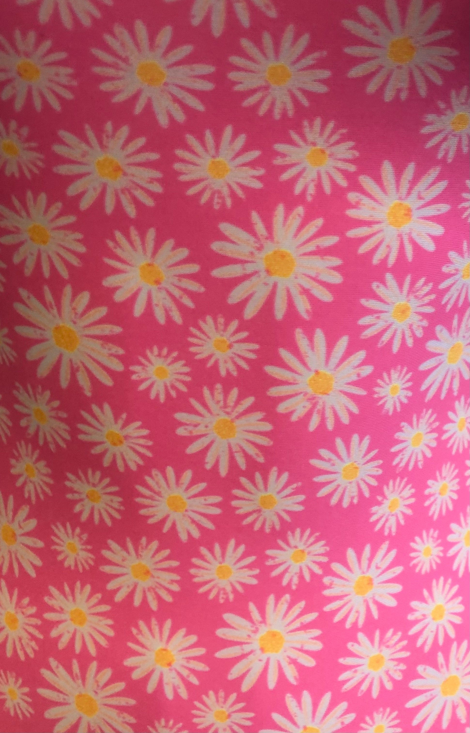 Bright pink fabric with little daisies 