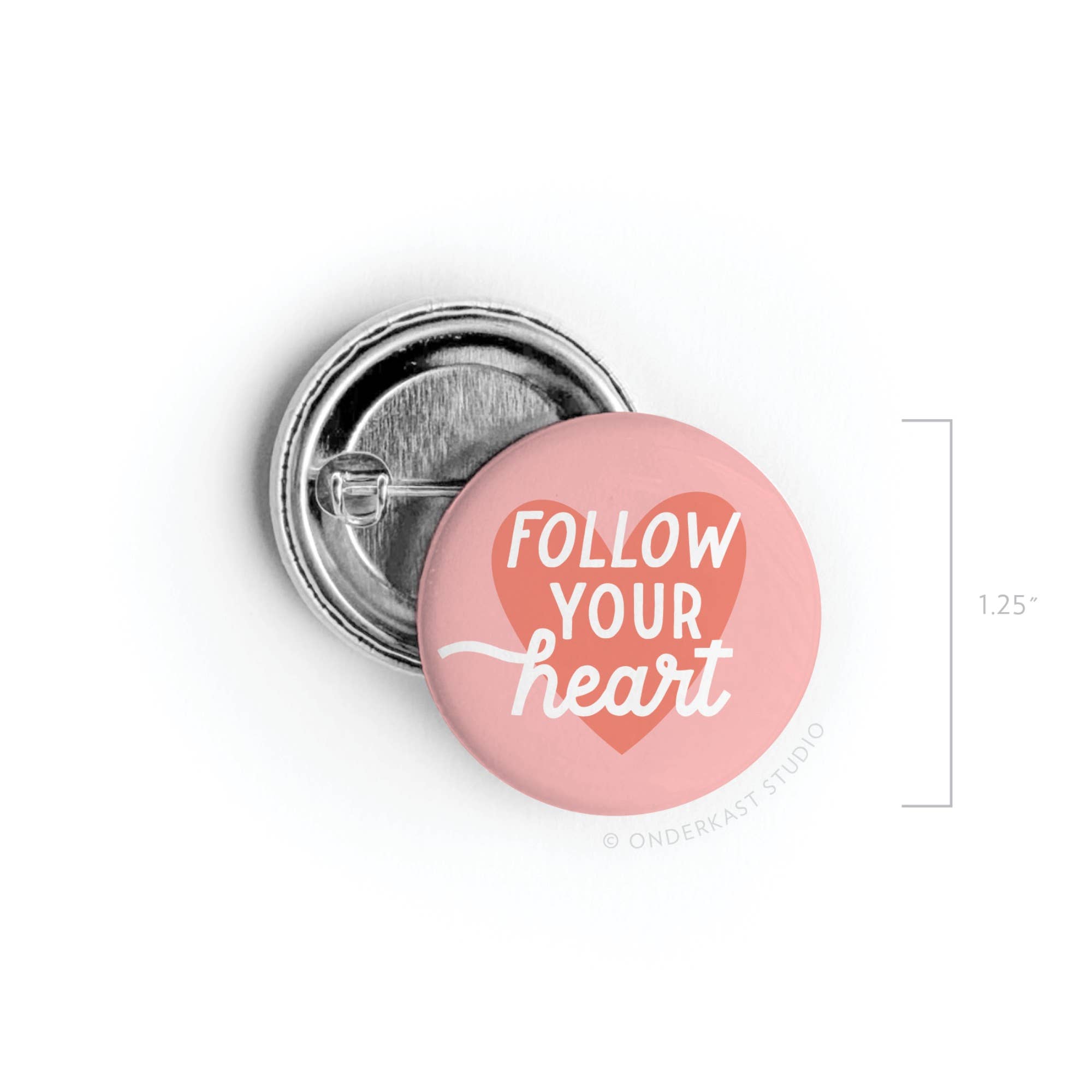 Pink 'Follow Your Heart' button pin, 1.25 inch size.