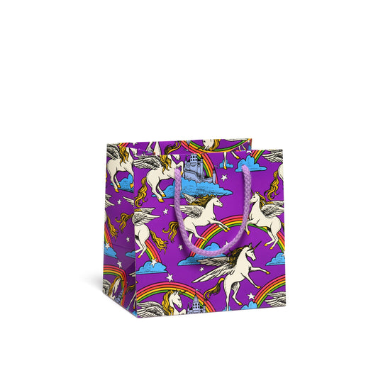 small purple gift bag with unicorns