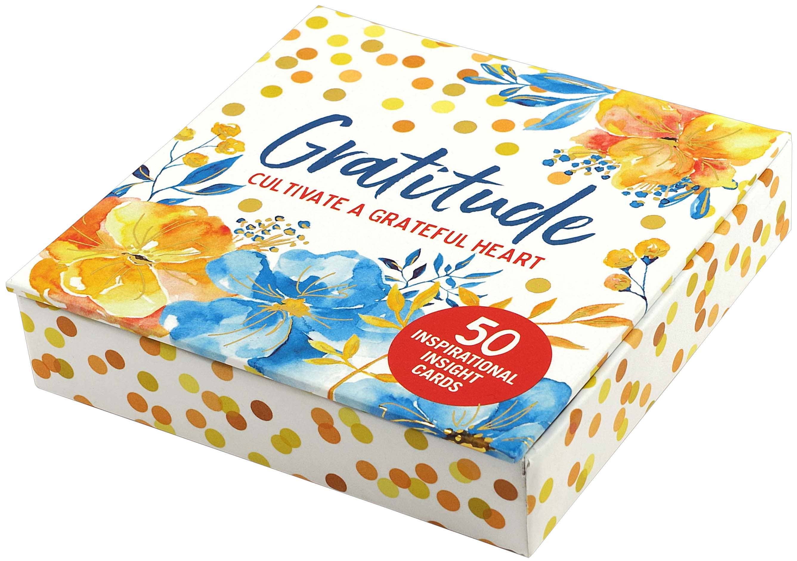 Box of 'Gratitude' cards with floral design and text on a white background