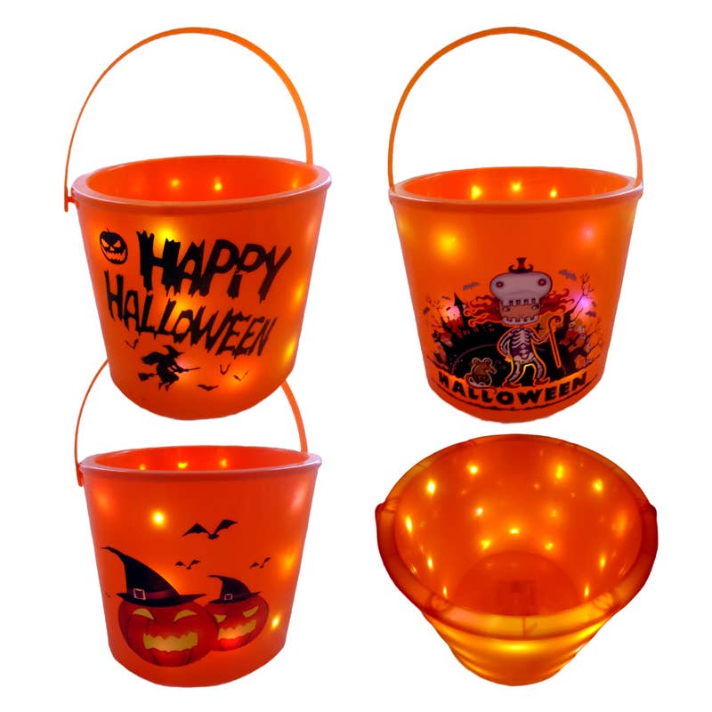 Set of orange Halloween-themed buckets with LED lights on a white background