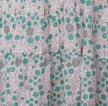 Floral patterned fabric with green and brown flowers on a light background