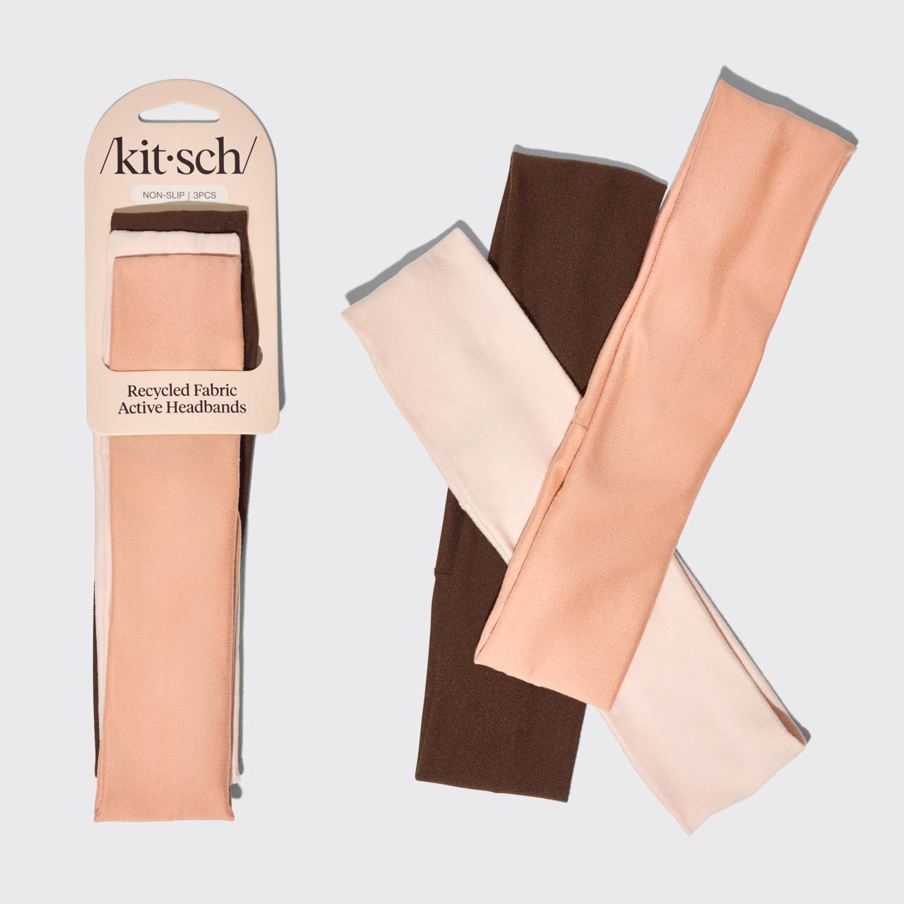 Kit-sch recycled fabric active headbands in various colors with packaging on a light gray background