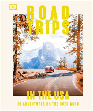 Book cover of 'Road Trips in the USA' with a scenic road and mountain view.