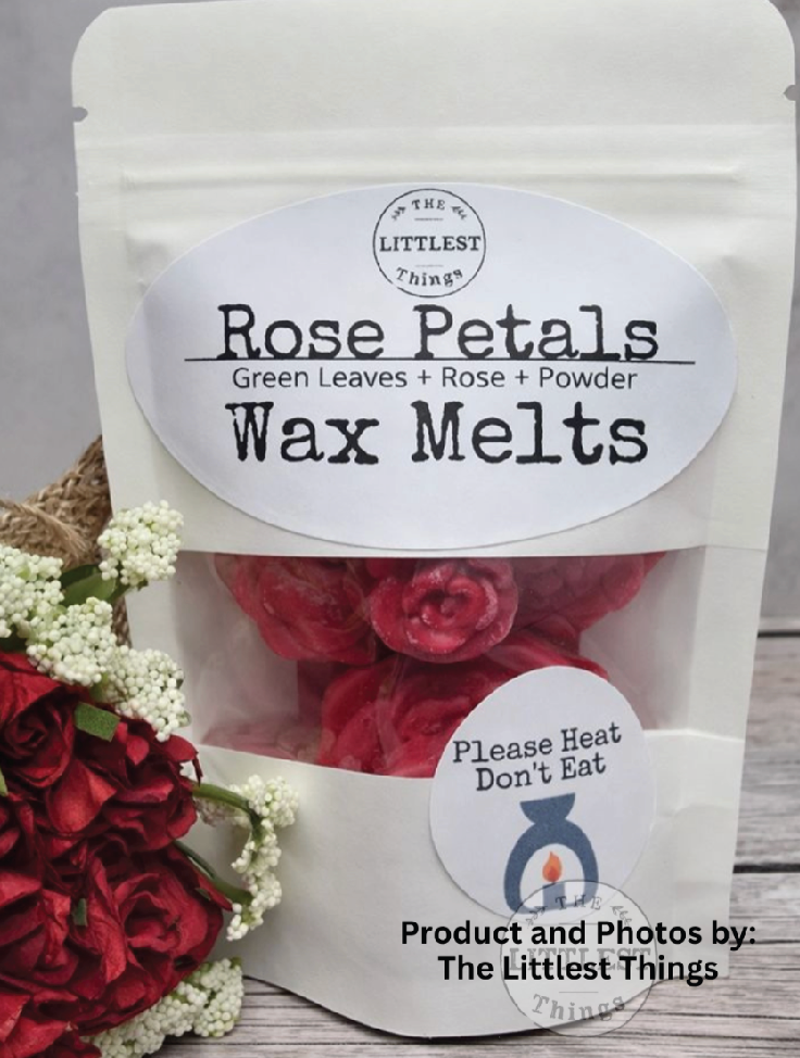 Packaging of 'Rose Petals Wax Melts' with roses on a wooden surface