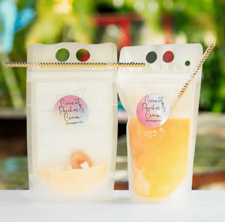 Coconut Peaches & Cream champagne mix in pouches with straws, before and after mixing.