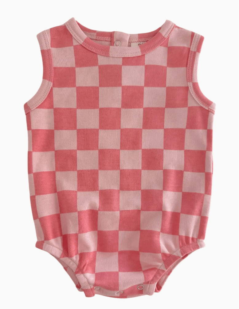 Pink and white checkered baby romper on a white background
