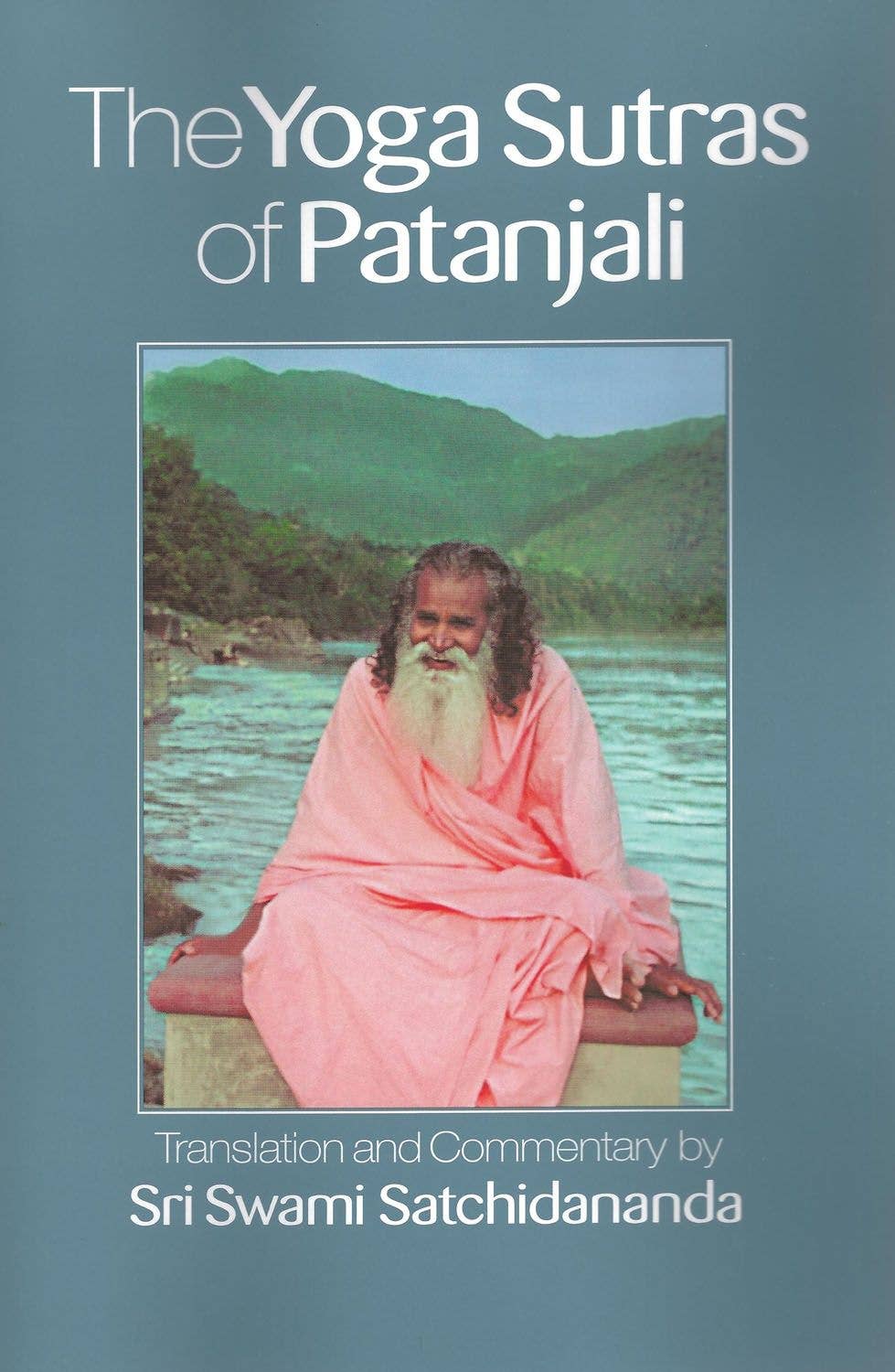 Book cover of 'The Yoga Sutras of Patanjali' with a sage sitting by a lake.