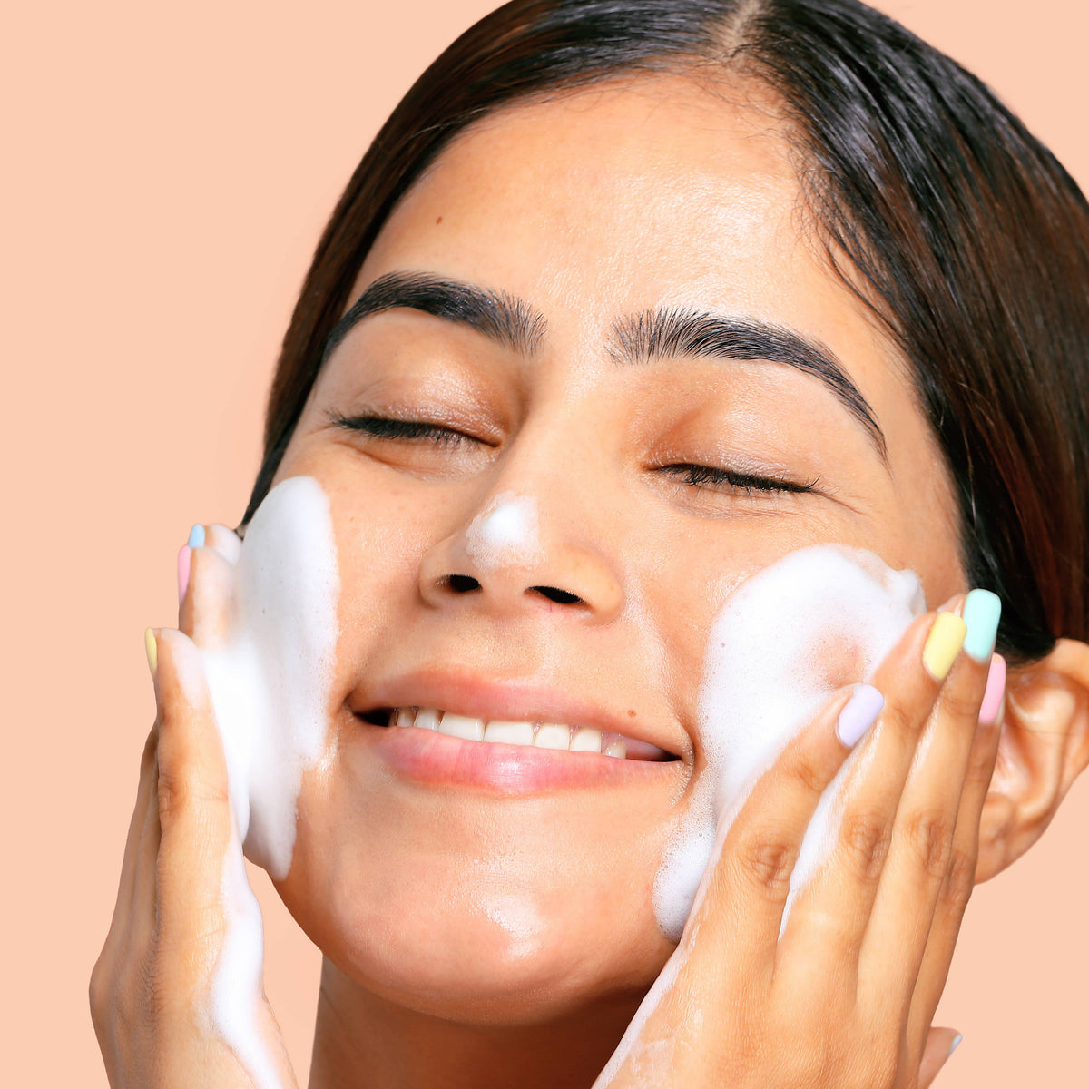 gift washing her face with facial wash cleanser