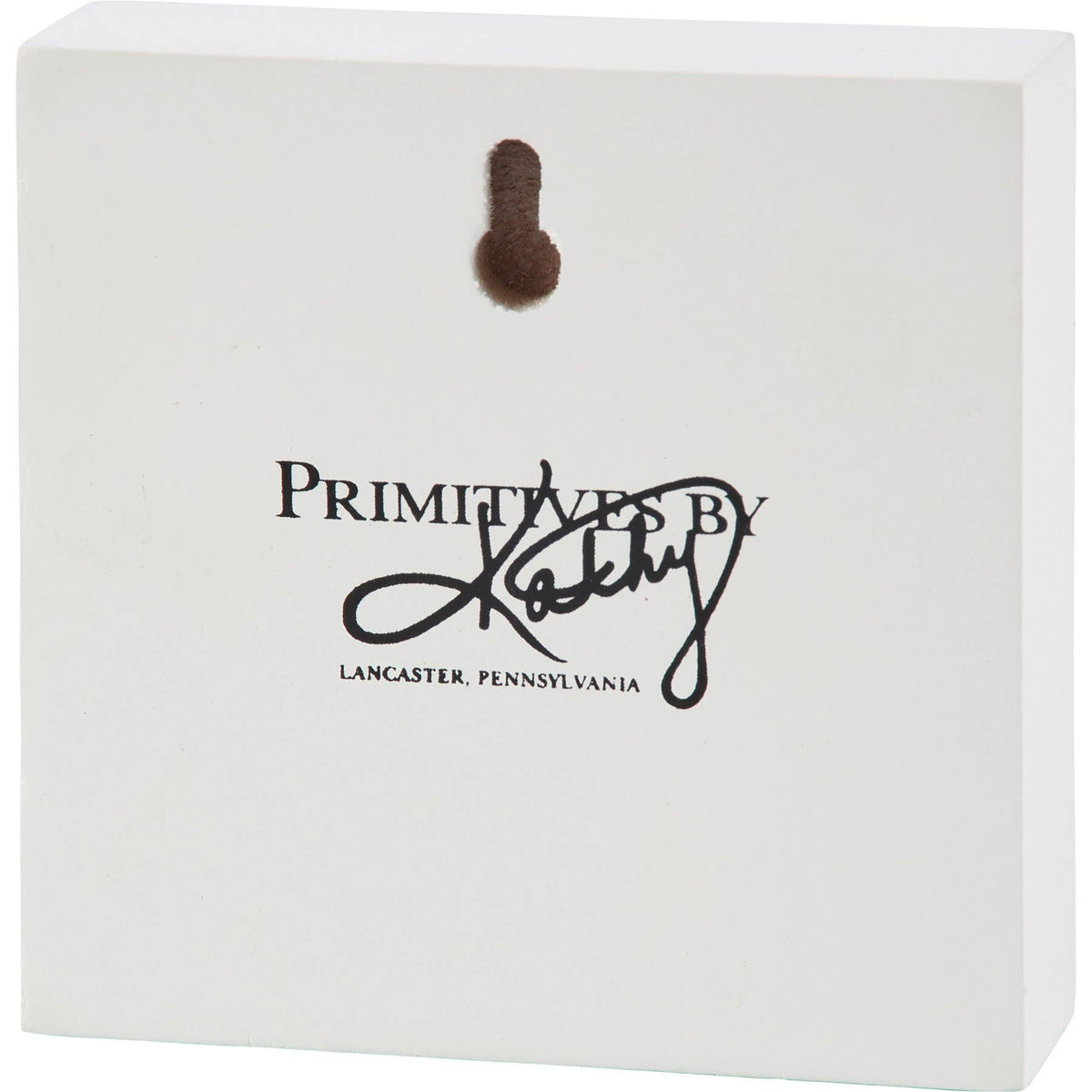 White square product box with a hanging loop at the top and printed black text reading 'PRIMITIVES BY KOKUSH' and 'LANCASTER, PENNSYLVANIA'.