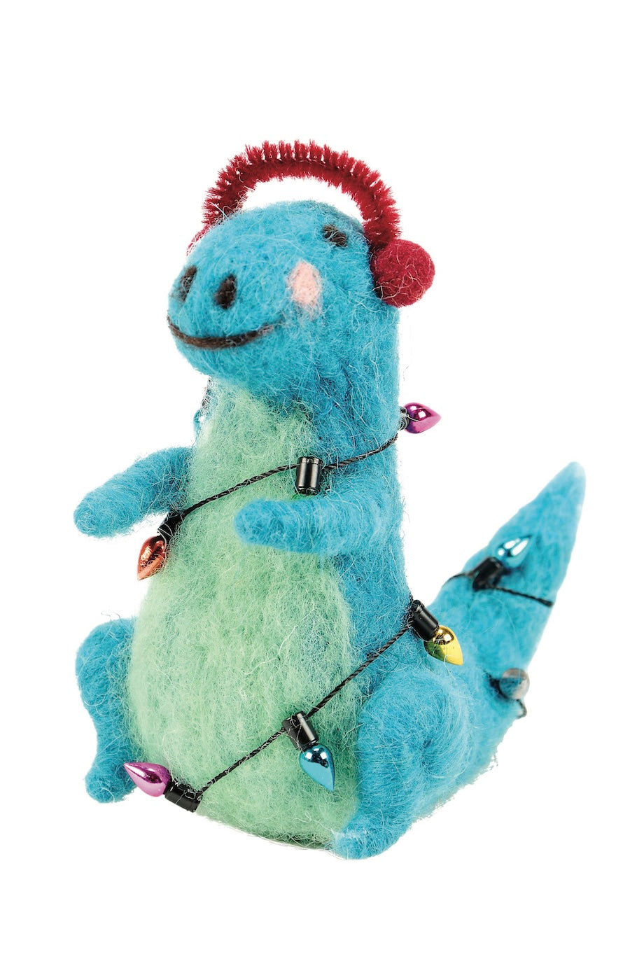A blue and green felt dinosaur plush toy wearing red earmuffs and wrapped in multicolored Christmas string lights, isolated on a white background.