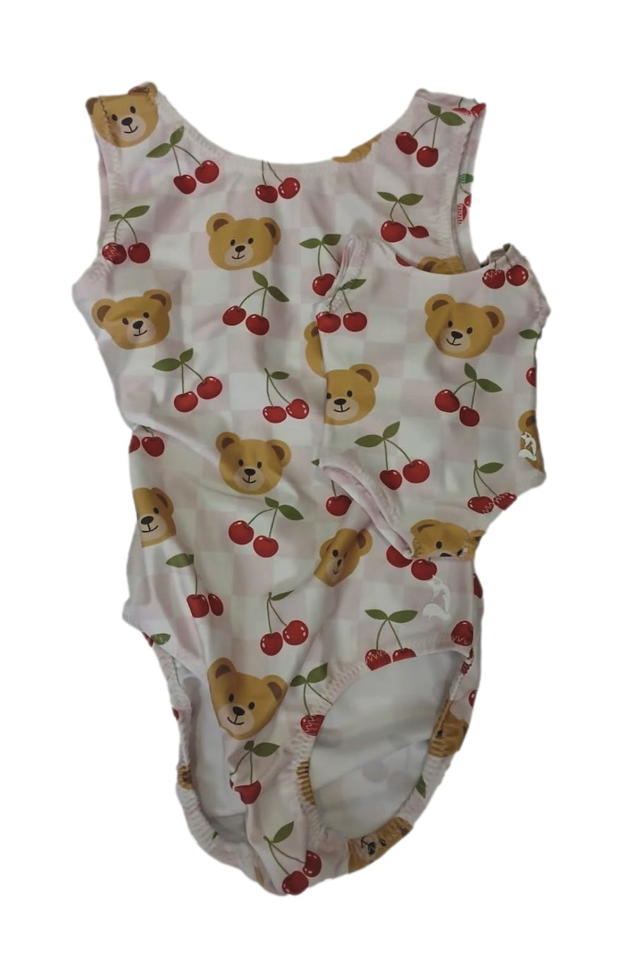 A sleeveless baby romper or bodysuit with an all-over print of teddy bears and cherries on a light pink and white checkered background.