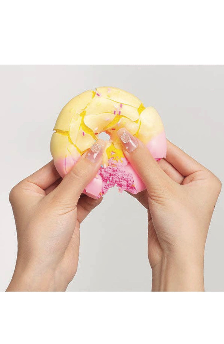 pink and yellow fidget sensory squishy donut crackle toy