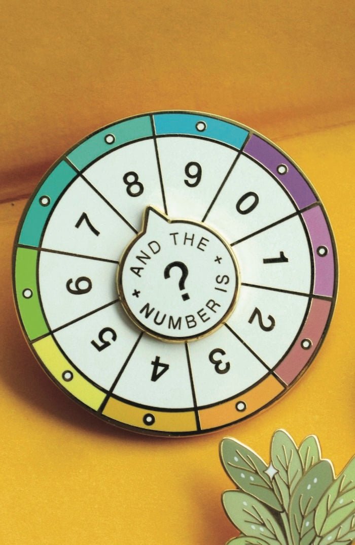 Spinning Numbers Enamel Pin - Foxy’s