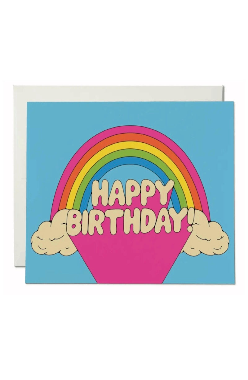 Greeting card with rainbow and 'Happy Birthday!' text on a blue background