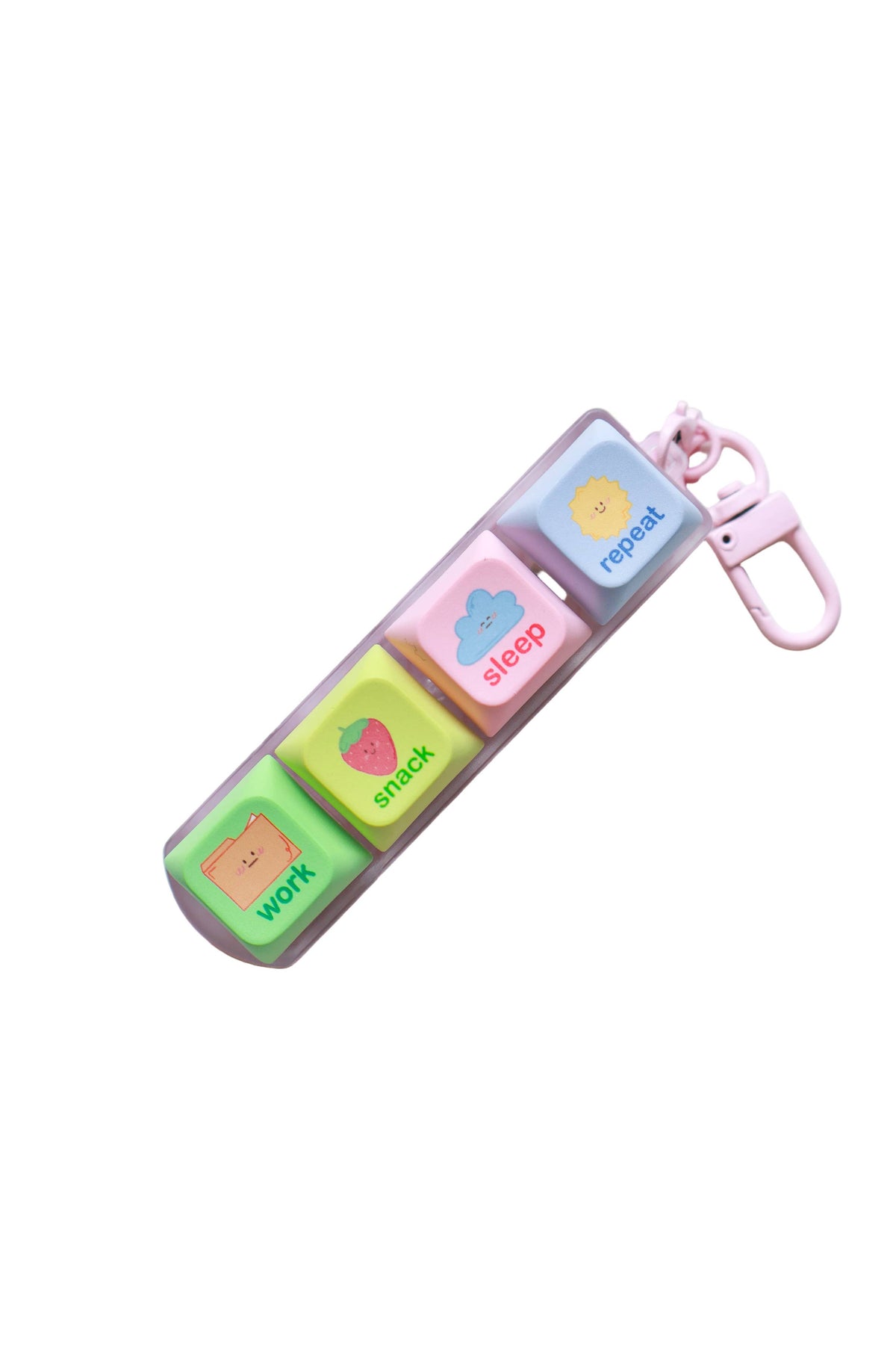 A pastel-colored keychain organizer with four square buttons labeled 'work', 'snack', 'sleep', and 'repeat', attached to a pink keychain clip, shown on a plain white background.